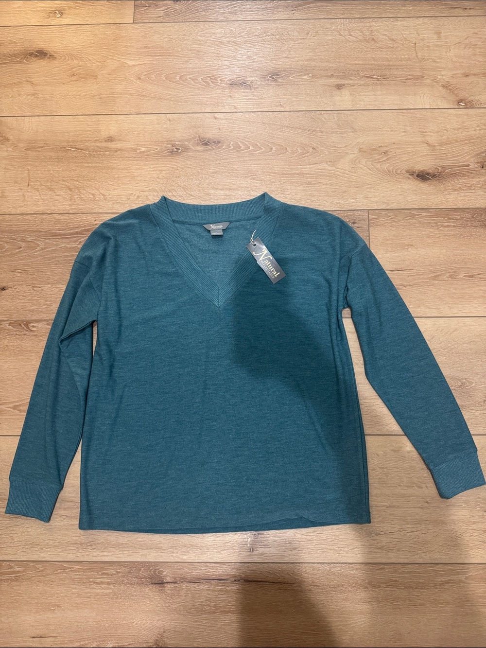 Natural reflections large V neck top